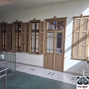 תחזוקה ושחזור תריסי עץ